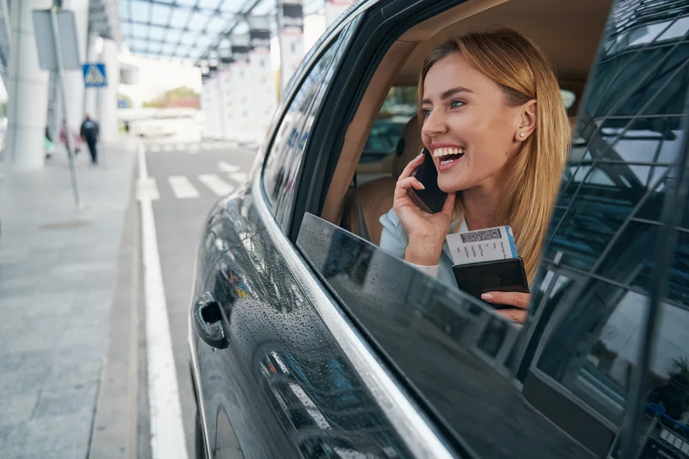 A passenger calling to confirm her pre-booked Captain Taxis pickup on arrival at Sydney Airport